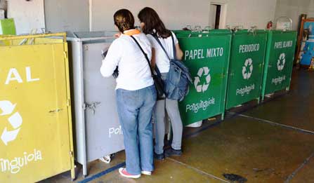 Students check out the recycling bins